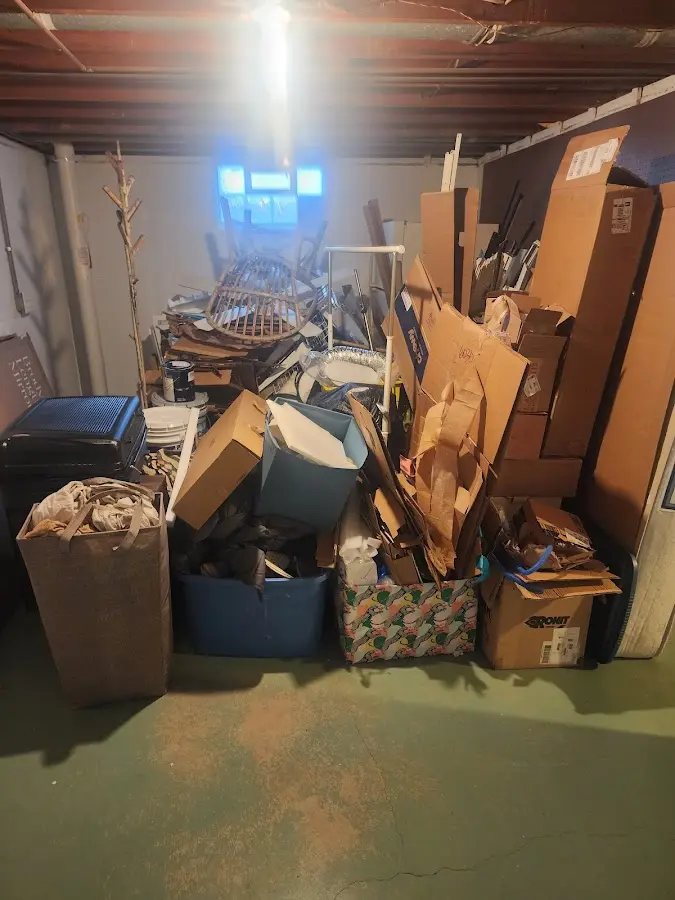 Roll-off dumpster container at job site for Construction Dumpster Rental in Warren